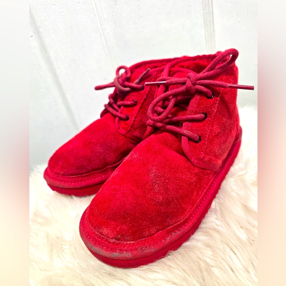 UGG kid’s Neumel suede boots in the Samba Red color.